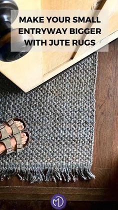 a person's feet on a rug with the words how to make your small entryway bigger with jute rugs