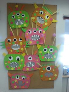 a bulletin board with monster faces on it in the shape of toothpicks and teeth