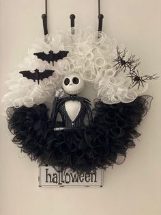 a halloween decoration hanging on the wall