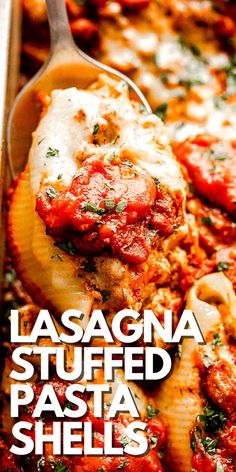 lasagna stuffed pasta shells in a casserole dish with a serving spoon