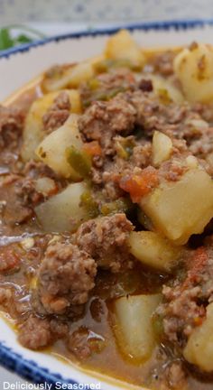 A plate full of Mexican picadillo with diced potatoes and meat. Picadillo With Potatoes, Chorizo Picadillo Stew, Ground Beef Recipes And Potatoes, Beef Picadillo Mexican, Hamburger Meat Potatoes Tomato Sauce, What Can I Do With Ground Beef, Meat And Potatoes Recipes Mexican, Ground Beef Potatoes Green Beans, Hamburger Meat And Potatoes Recipes Mexican