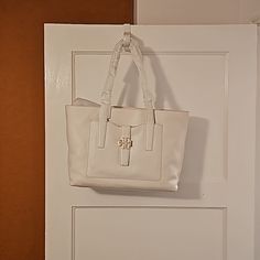 Nwt: Tory Burch Ivory Tote White Formal Tote Bag, Elegant White Double Handle Shoulder Bag, Elegant White Double Handle Bag, Elegant White Double Handle Bags, Elegant White Satchel For Shopping, Designer White Shoulder Bag With Magnetic Closure, Elegant White Tote Bag, Chic Cream Bag With Magnetic Closure, Chic Cream Bags With Magnetic Closure