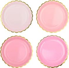 four pink and gold plates with scalloped edges