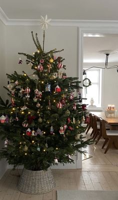 a decorated christmas tree in a living room