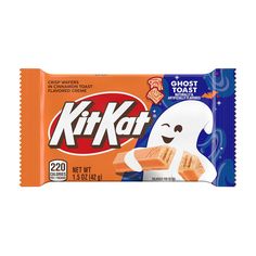 an orange and white candy bar with ghost on the top, sitting in front of a white background