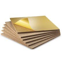 several pieces of gold colored paper stacked on top of each other