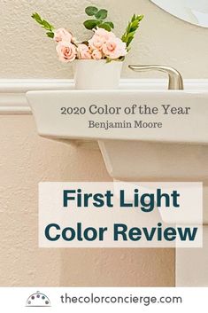 a bathroom sink with pink flowers in it and the words, first light color review