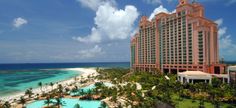 an aerial view of the resort and beach