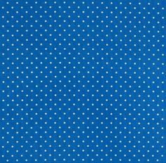 a blue background with white polka dots