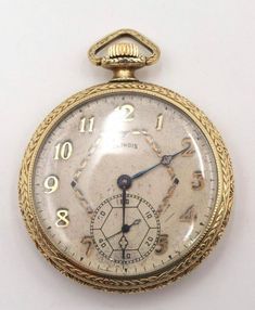 Illinois 14Kt Gold Filled Pocket Watch. 25 year extra fancy case, fancy dial, 12 size, 1923, grade 405. Antique 14k Stamped Watches, Antique 14k Stamped Round Watches, Vintage Yellow Gold Pocket Watch With Skeleton Dial, Antique Gold Watch With Skeleton Dial, Vintage Clocks, Sun Sets, Etsy Personalized Gifts, Pocket Watches, Treasure Island