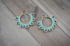 These gorgeous turquoise beaded hoop earringsare made with high quality  Japanese seed beads, crystal beads and gold plated hoops . 1 1/2 'inches Hoop size: 1 " inch  *All orders are shipped within 3-7 business days (after the order has been placed) by first class mail with a tracking information. If you need sooner please let me know. All custom orders will be shipped within 1-2 weeks.  *All pieces are handmade and each piece is unique and should be handled with care. Please be kind to your jew Turquoise Hoop Jewelry With Tiny Beads, Turquoise Hoop Earrings With Tiny Beads, Turquoise Hoop Beaded Earrings For Jewelry Making, Turquoise Hoop Earrings With Dangling Beads, Festival Turquoise Hoop Earrings With Colorful Beads, Turquoise Beaded Small Hoop Earrings, Turquoise Beaded Hoop Earrings, Turquoise Hoop Earrings For Festival, Seed Beading