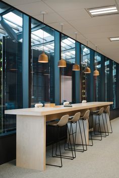 an empty conference room with chairs and tables