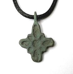 The products offered unconditionally guaranteed to be authentic. See images for a Correct impression. Material: Bronze Condition: Very good / Wearable / see photos Date: 10th - 11th century Measurements: 26 x 17 mm (1,02 х 0,66 inches) Item Number: e 90 THIS IS A WONDERFUL GIFT FOR THE VIKING HISTORY ENTHUSIAST IT CAN ALSO BE WORN AS AN ANCIENT TALISMAN ------------------------------------------------------------------- When buying items from our shop you can be assured that: You will find an in Medieval Engraved Cross Pendant Jewelry, Handmade Medieval Cross Jewelry, Medieval Cross Necklace As Gift, Medieval Cross Pendant Necklace Gift, Medieval Cross Necklaces As Gifts, Medieval Cross Necklace For Gift, Antique Pendant Cross Necklace As Gift, Antique Handmade Cross Pendant Necklace, Ancient Talisman