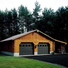 two garages in the middle of a field with grass and trees around them,