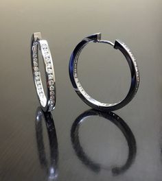 DeKara Designs Clearance Classic 14K white gold diamond hoop earrings. 10.6 Grams. Meta- 14K White Gold, .583. Stones- 68 Round Diamonds, F-G Color VS2 Clarity, 2.05 Carats Earrings are professionally channel set, and come with a built it secure lock push post. The circumference of the earrings is 1.25 inches. 3 MM Wide, 2.75 MM Thick. Handmade 14K White Gold Diamond Hoop Earrings. Each earring has a total of 39 round channel set diamonds. The earrings have 24 diamonds in the from, and 15 in the Gold Hoop Diamond Earrings, Hoop Diamond Earrings, Gold Diamond Hoop Earrings, Opal Band, Handmade Modern, Diamond Hoop Earrings, Channel Set, Gold Hoops, Engagement Rings Sapphire