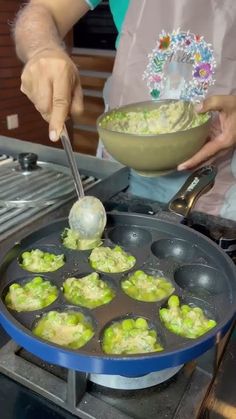 a person cooking food in a frying pan