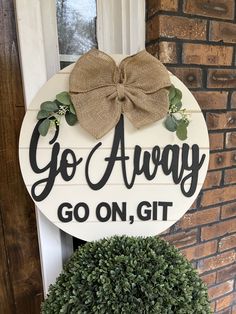 "Funny Door Sign, Go Away Door Sign, Go Away, Go on Git Sign, Funny Door Decor, Funny Housewarming Gift, Go Away Sign, Door Sign Go Away, Go on Git Door Sign looks great on any front door or porch.  This Door Sign is best kept on a covered front porch or door to protect it from the elements.  Two Sizes available  11\" - comes with Burlap Bow and twine for hanging 21\"- comes with burlap bow, greenery, and twine for hanging.  Thank you so much for choosing to shop small, I truly appreciate your b Snarky Welcome Signs, Homemade Door Signs, Front Door Sign Ideas, Funny Door Hangers, Coop Signs, Funny Door Signs, Etching Ideas, Funny Housewarming Gift, Pizza Pans