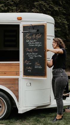 Photo of a cocktail menu on a chalkboard connected to a horse trailer mobile bar at a Colorado wedding. Mini Bar Trailer, Mobile Horse Trailer Coffee Bar, Coffee Trailer Set Up, Horse Trailer Converted To Coffee Bar, Horse Trailer Turned Coffee Bar, Bar Cart Trailer, Western Mobile Bar