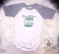 Excited to share this item from my #etsy shop: You Call Him Coach, I Call Him Daddy, Coach's Kid, Sports Bodysuit, Daddy Coach, Baby Bodysuit #sportsonesie #daddyonesie #youcallhimcoach #daddycoach #coachskid #babyclothing #infantclothing #babygift #customonesie Sports Bodysuit, Custom Onesies, Grey Shorts, You Call, Gender Neutral Baby, Black Bodysuit, Long Sleeve Bodysuit, Baby Bodysuit, That Way