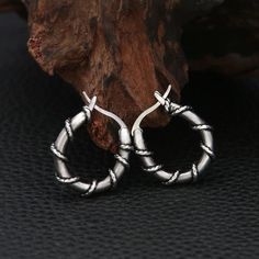 Vintage Viking Style Thick Stainless Steel Hoop Earrings for Unisex - Fashion Punk Hip Hop Jewelry Silver Trendy Hoop Earrings For Streetwear, Metal Hoop Earrings For Streetwear, Small Metal Hoop Earrings Punk Style, Adjustable Punk Hoop Earrings, Trendy Metal Hoop Earrings For Streetwear, Small Punk Silver Hoop Earrings, Small Silver Punk Hoop Earrings, Silver Small Hoop Punk Earrings, Punk Style Small Hoop Nickel-free Earrings