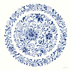 a blue and white floral design in the middle of a circular pattern on a white background