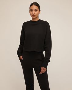 Our So Uptight Loop Back Raglan Sweatshirt is crafted from plush cotton and features a high rib neck, exaggerated raglan sleeves and a slightly cropped fit. This is a classic silhouette modernized for your everyday, anywhere style. Pair it back to any of our leather bottoms for a sleek, elevated look or hook her up with our so high-waisted sweatpants. Boxy fit High crew neckline Ribbed trim on collar and sleeve cuffs Raglan sleeves Cropped fit French Terry loop-back interior 100% Cotton Model is High Waisted Sweatpants, Marissa Webb, Raglan Sweatshirt, Classic Silhouette, Raglan Sleeve, Crew Neckline, French Terry, Sweatpants, Sleek