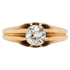 an old mine cut diamond ring in yellow gold