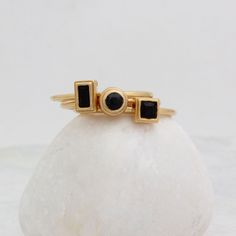 "Know someone with a timeless sense of style ~ this is the perfect gift! Stackable rings are the IT accessory. Wear by itself or pair with with an initial ring! **This listing is for one 24K Gold Vermeil stackable Swarovski crystal Onyx ring. Round, square and rectangle settings are available.** Also available in birthstones: January, February, March, April, May, June, July, August, September, October, November, or December here: https://www.etsy.com/listing/230740149 See these rings in Sterling Black Minimalist Stackable Rings For Anniversary, Minimalist Black Stackable Rings For Anniversary, Minimalist Black Sapphire Ring For Gift, Minimalist Black Sapphire Ring As Gift, Minimalist Stackable Black Rings, Black Minimalist Stackable Jewelry, Modern Black Adjustable Rings, Black Onyx Stackable Jewelry, Adjustable Onyx Rings With Black Enamel