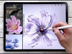 a person is drawing flowers on an ipad with a pencil and watercolor paper in front of them