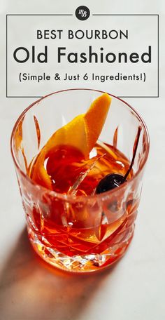 the best bourbon old fashioned is served in a glass with an orange peel on top