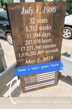 a wooden sign with an american flag on it that reads july 1, 1960 and three years