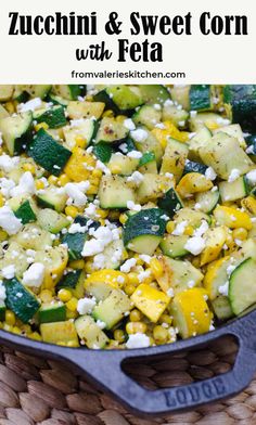 zucchini and sweet corn with feta in a skillet on a wicker basket