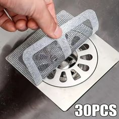 a person is using a grater to clean a drain in a sink with the words 30ps above it