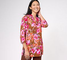 Brighten your mood (and your day!) when you're wearing this 3/4'sleeve tunic. The elegant floral print brings a symphony of vibrant colors and intricate patterns that give this top its artistic flair. From Isaac Mizrahi Live!TM. Spring Tunic With Vibrant Print, Spring Vibrant Print Tunic, Multicolor Floral Print Spring Tunic, Multicolor Printed Spring Tunic, Printed Multicolor Spring Tunic, Multicolor Printed Tunic For Spring, Spring Floral Print Long Sleeve Tunic, Spring Tunic With 3/4 Sleeve And Relaxed Fit, Spring Pink Printed Tunic