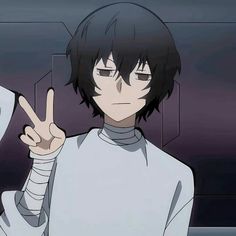 an anime character with black hair pointing to the side and holding his finger up in front of him