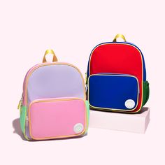 Designed for kids (but sometimes worn by adults too), the Mini Backpack is a must-have for heading to school or for trips near & far! Fill it with school supplies or a change of clothes or shoes. Don't miss the super-helpful water bottle holder on the side. *This backpack is often worn by adults, but is fit for a child Playful Backpack For Daily Use, Playful Standard Backpack For Daily Use, Functional Backpack For Playtime, Playful Everyday Standard Backpack, Playful Backpack For Everyday Use And Back To School, Everyday Use Backpack, Sporty Backpack For Travel And End Of School Year, Sporty School Backpack For Back To School, Sporty Backpack For Back To School