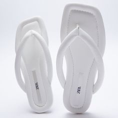 Zara Flat Quilted Sandals Slides Slippers Slip On White New Brand New Without A Box. Chic Flat Flip Flops For Day Out, Chic Synthetic Toe Post Flip Flops, Chic White Flip Flops For Vacation, Zara Toe Post Sandals For Summer, Chic White Flip Flops For Spring, Chic White Synthetic Flip Flops, Chic White Sandals With Textured Footbed, White Zara Sandals For Vacation, Zara White Leather Sandals