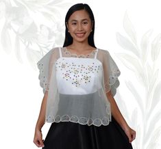 Kimona Tulle Blouse - One Size ( 5 Colors Available) Step into timeless elegance with the Kimona Tulle Blouse, a versatile and exquisite piece that embodies the grace of traditional Filipino attire with a contemporary twist. This blouse, crafted from soft, high-quality tulle, offers a lightweight and breathable feel, making it perfect for any occasion, whether you're attending a formal event or adding a touch of sophistication to your everyday look. The Kimona Tulle Blouse is designed in a one-s Filipino Attire, Tulle Kimono, Filipiniana Top, Traditional Skirts, Tulle Blouse, Tulle Fabric, The Grace, Draped Fabric, Look Plus