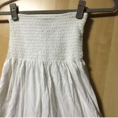 An Adorable Tube Top That Can Also Be A Mini Dress Or Cover Up! In A White Color, Tube Style At Top Then Flows Down, With A Lace Trim Edge And Slight Sequins Details. Can Fit An Xsmall To Small. Stretchy. Brand New With Tag. Questions Welcomed. Sleeveless Cotton Dress With Elastic Waistband, White Stretch Dresses With Smocked Back, White Stretch Dress With Smocked Back, Casual White Strapless Sundress, Casual White Dress With Elastic Waistband, Stretch Cotton Mini Dress For Beach, Stretch Cotton Mini Dress For The Beach, Sleeveless Summer Sundress With Elastic Waistband, Summer Sundress With Elastic Waistband