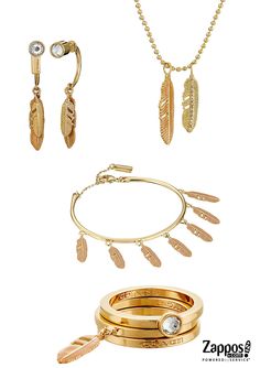 Complement your free spirit by accessorizing with Coach's latest feather necklace, bracelet, earrings and stacked rings. Its luxuriously smooth enamel adds richness to a pair of intricate metalwork feathers, gracefully dangling from a sparkling crystal stud. The custom cast, lavishly plated design is accented with a single, iconic Coach hangtag. Elegant Coach Jewelry In Yellow Gold, Elegant Coach Yellow Gold Jewelry, Everyday Gold Coach Jewelry, Chic Metal Jewelry With Charms, Chic Metal Charm Jewelry, Everyday Silver Coach Jewelry, Elegant Brass Earrings With Charms, Chic Coach Jewelry As Gift, Chic Coach Jewelry As A Gift