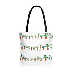 a white tote bag with potted plants on the front and side, all over