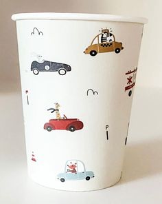 a paper cup with cars and trucks on it