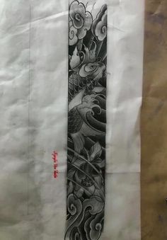 a large black and white tattoo design on a piece of paper