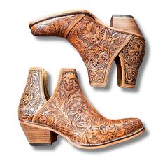 Step into the epitome of Southwestern flair with these Western leather booties, meticulously hand-tooled to highlight a stunning blend of rich bourbon hues. Featuring classic cowboy heels and convenient side slits, they blend traditional craftsmanship with modern ease. The intricate design, showcasing a pattern of desert blossoms, adds a distinctive touch of elegance. Ideal for transforming any ensemble, these tooled boots exude statement-making style with every step. 2" slanted heel. 6-11 not a Western Brown Boots With Stacked Heel, Brown Hand Tooled Boots For Western-themed Events, Hand Tooled Brown Boots For Western-themed Events, Hand Tooled Country Boots For Fall, Brown Heeled Boots With Leather Sole For Ranch, Hand Tooled Boots For Ranch In Fall, Bohemian Brown Boots For Western-themed Events, Western Brown Heeled Boots With Leather Lining, Western Hand Tooled Boots For Fall