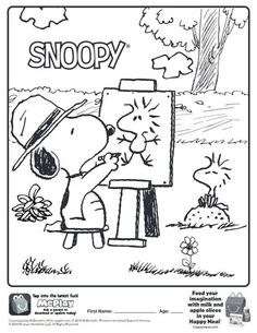 snoopy is painting on an easel in the park