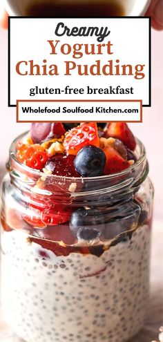 chia pudding in a glass jar with berries and blueberries on top, topped with yogurt