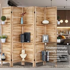 a room divider made out of wood with plants and books on the top shelf