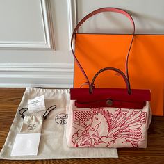 Limited Edition 100% Authentic Hermes Pegase Pop Red Herbag Zip 31. Brand New. Never Used. Accessories: Dust Bag, Box, Interior Zip Pouch, Lock & Keys Measurements: Handle Drop 3", Height 10", Width 11.75", Depth 4.25", Strap Drop 17.75" Designer: Hermes Model: Pegase Pop Herbag Zip Toile And Leather 31 Exterior Material: Canvas Plain, Leather Exterior Color: Red Interior Material: Canvas Plain Interior Color: Red Hardware: Palladium-Plated Hardware Receipt Can Be Provided Red Shoulder Bag With Original Box For Daily Use, Red Shoulder Bag For Daily Use With Original Box, Hermes Canvas Bag, Red Bag For Everyday Use, Red Pegasus, Hermes Evelyne Iii, Hermes Lindy, Orange Handbag, Hermes Model