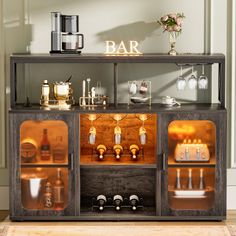 the bar is made out of wood and glass