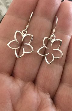 ".925 Sterling Silver Hawaiian Plumeria Large dangle Earrings. The size is 17MM, just under 3/4\". Top-selling collection in our Hawaii stores. The Highly-reflective Sterling finish is beautiful, nickel-free and long-lasting. These will shine for years to come. --The Plumeria is given here in Hawaii as a symbol of love and friendship. Handmade with Aloha in Maui. Packaged ready for gifting with a Hawaiian Plumeria story, Sterling silver cleaning instructions, jewelry pouch and gift box. Practice Hypoallergenic Silver Jewelry With Flower Pendant, Hypoallergenic Silver Flower Pendant Jewelry, Hypoallergenic White Gold Flower-shaped Jewelry, Silver Teardrop Flower Earrings, Silver Teardrop Flower Earrings For Pierced Ears, Delicate Sterling Silver Flower Earrings For Jewelry Making, Silver Teardrop Flower Earrings In Sterling Silver, Dainty Sterling Silver Flower Jewelry, Dainty Flower-shaped Sterling Silver Jewelry